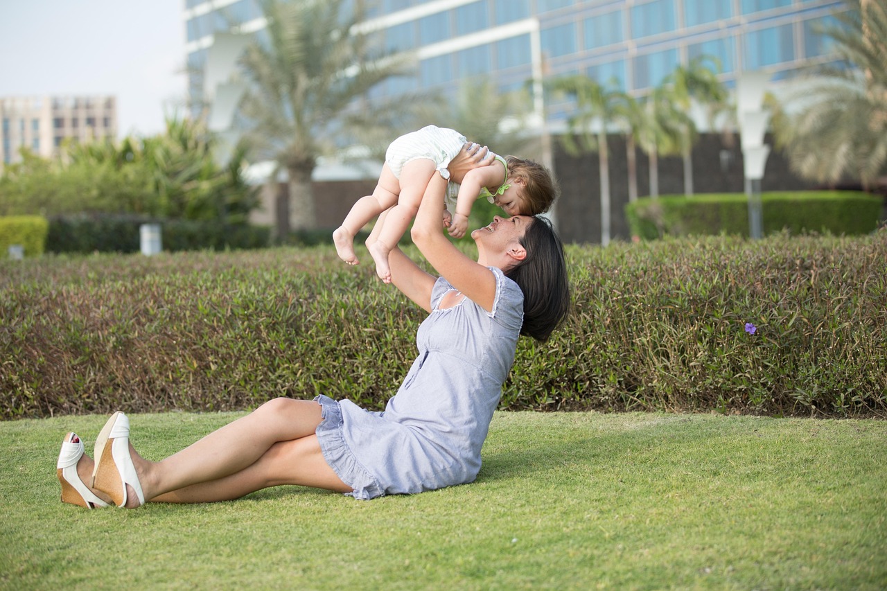 Mother playing in a park