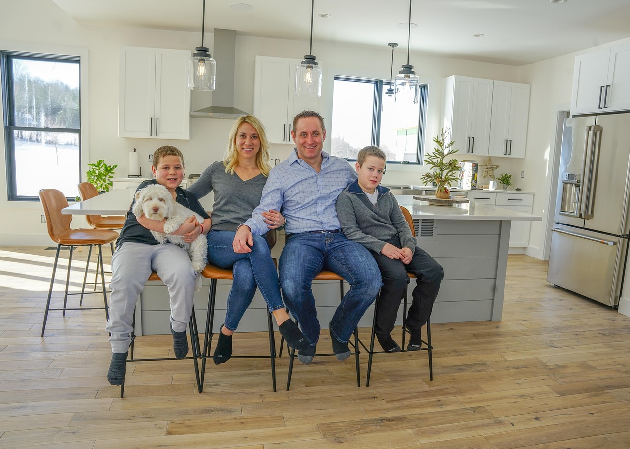 Family with their dog in the kitchen