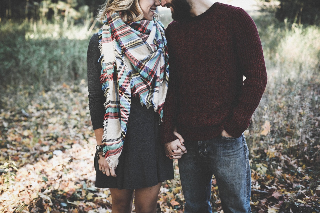 Couple smiling outdoors